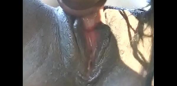  Gorgeous black gitls are fucking each other with dildos outdoors